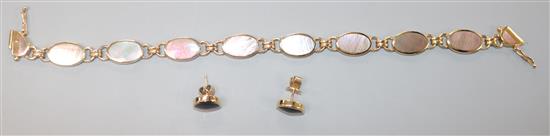 A 9ct gold and mother of pearl oval link bracelet and a pair of stud earrings en suite, cased.